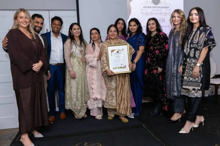 Award winners on stage with their certificate at the Asian Restaurant Awards Ireland