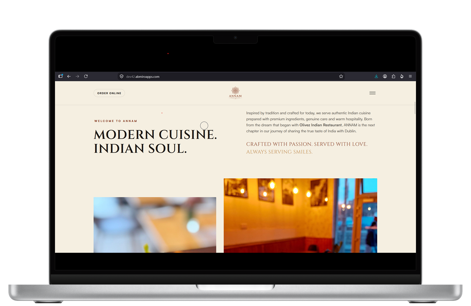 ANNAM restaurant website shown on a MacBook Pro